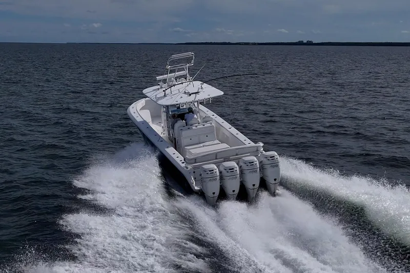  Yacht Photos Pics 2015 Bahama 41 boat cruising on open water with four powerful engines.