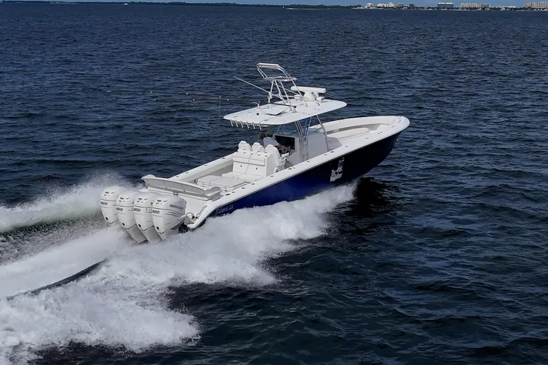  Yacht Photos Pics 2015 Bahama 41 boat cruising on open water with four powerful engines.