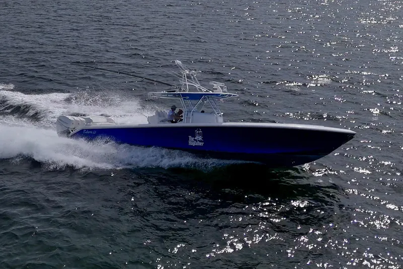  Yacht Photos Pics 2015 Bahama 41 boat cruising on open water, creating a dynamic wake.