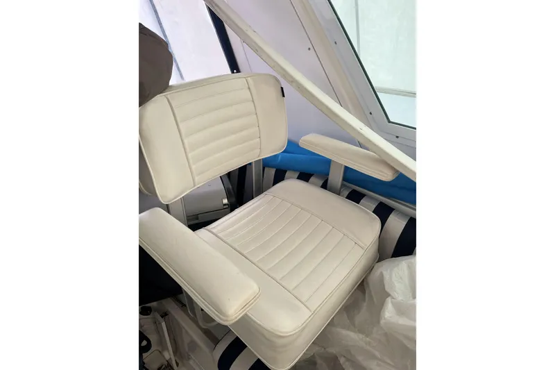  Yacht Photos Pics White captain's chair in 2008 Albin 28 Tournament Express boat interior.