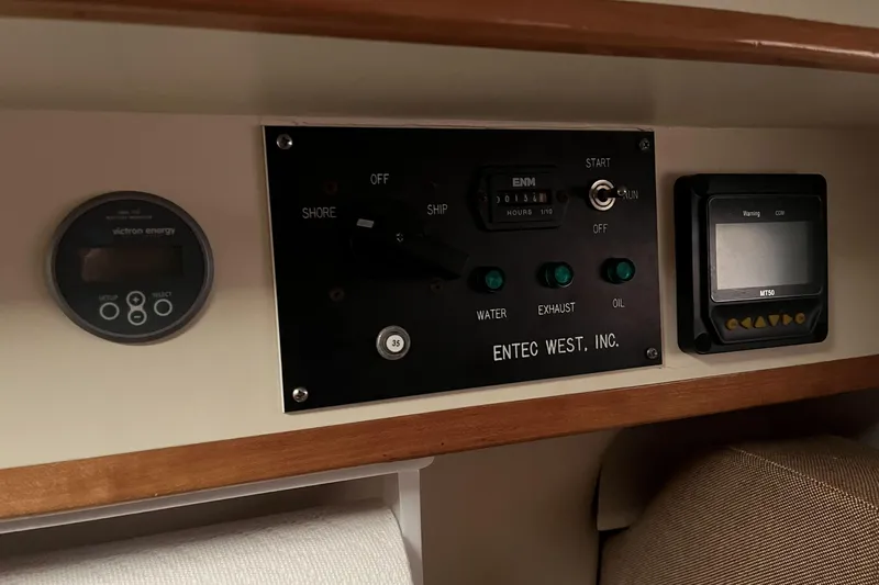  Yacht Photos Pics Control panel of a 2008 Albin 28 Tournament Express boat with gauges and switches.