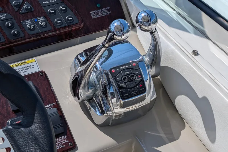 Fansea Yacht Photos Pics Control panel of a 2009 Sea Ray 350 Sundancer boat with throttle levers.