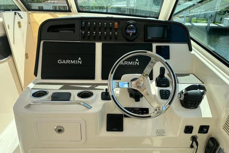 V5 Yacht Photos Pics 2019 Grady-White Freedom 375 helm with Garmin navigation and control systems.