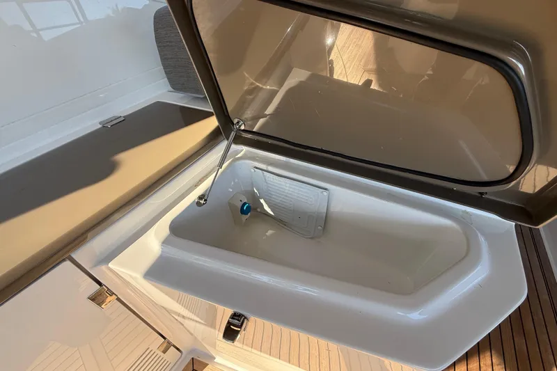  Yacht Photos Pics Open storage compartment on 2018 Azimut Atlantis 43 yacht, featuring sleek design and modern amenities.