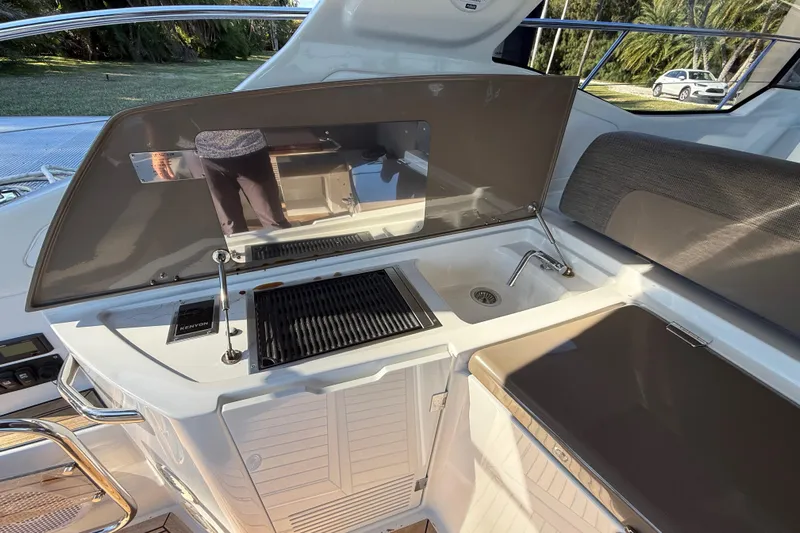  Yacht Photos Pics Outdoor kitchen on 2018 Azimut Atlantis 43 yacht with grill and sink.