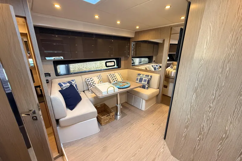  Yacht Photos Pics Luxurious interior of 2018 Azimut Atlantis 43 yacht with elegant seating and modern decor.