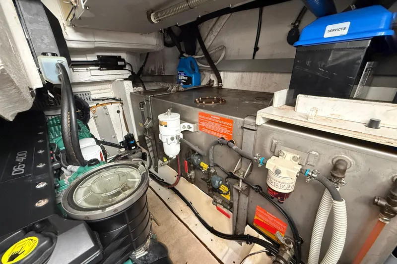  Yacht Photos Pics Engine room of 2018 Azimut Atlantis 43 yacht, showcasing mechanical components and systems.