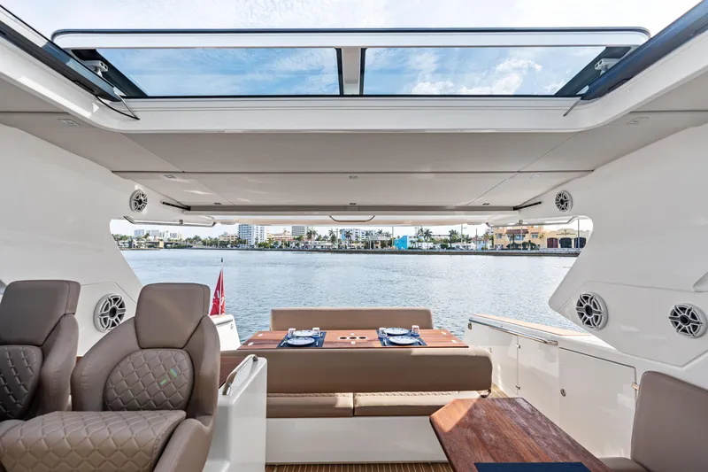  Yacht Photos Pics Luxurious interior of 2025 Makai M37 yacht with waterfront view and elegant seating.