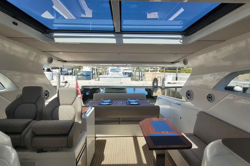  Yacht Photos Pics Luxurious interior of 2025 Makai M37 yacht with spacious seating and panoramic windows.