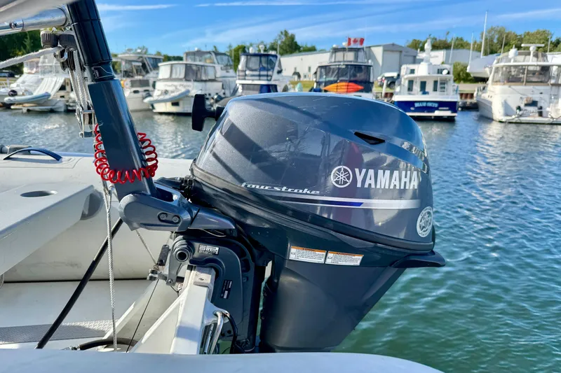 Ostrich Yacht Photos Pics Yamaha outboard motor on a 2004 Catalina 42 MkII, docked in a marina.