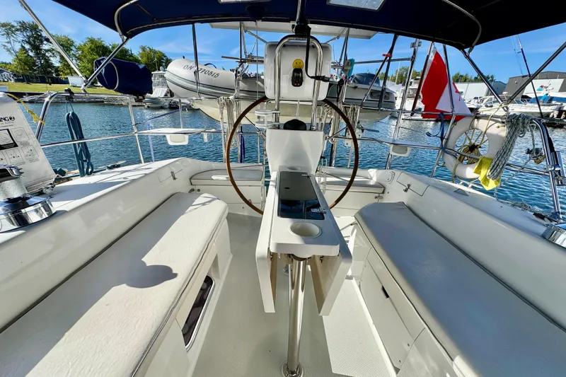 Ostrich Yacht Photos Pics Cockpit view of 2004 Catalina 42 MkII sailboat docked at marina.