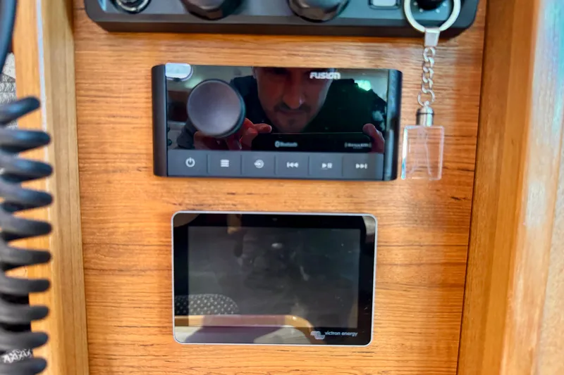 Ostrich Yacht Photos Pics Control panel of a 2004 Catalina 42 MkII sailboat with audio and display systems.