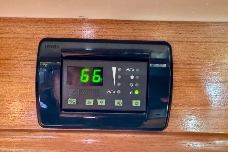 Ostrich Yacht Photos Pics Digital thermostat displaying 66 degrees on a Catalina 42 MkII yacht, 2004 model.