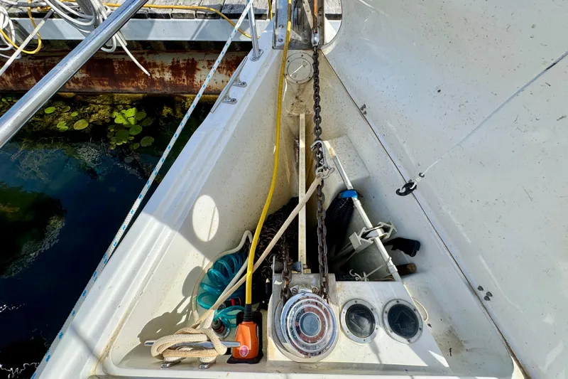 Ostrich Yacht Photos Pics Anchor locker of a 2004 Catalina 42 MkII sailboat with ropes and equipment.