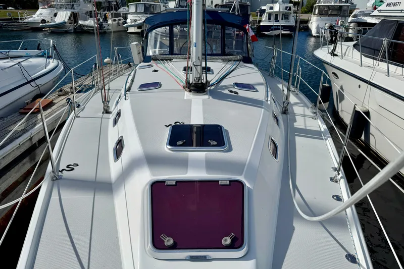 Ostrich Yacht Photos Pics 2004 Catalina 42 MkII sailboat docked at marina, showcasing deck and rigging.