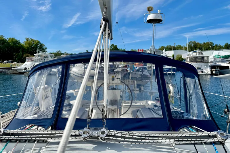 Ostrich Yacht Photos Pics 2004 Catalina 42 MkII sailboat docked at marina under clear blue sky.