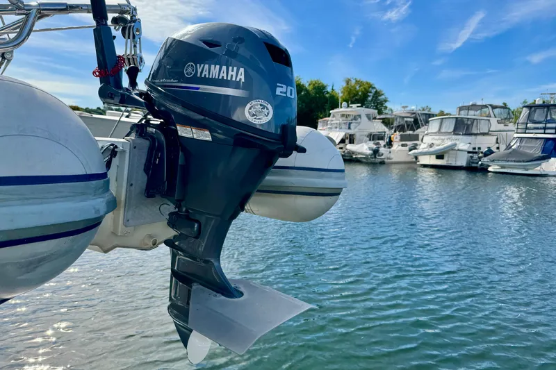 Ostrich Yacht Photos Pics Yamaha outboard motor on a Catalina 42 MkII, 2004, docked in a marina.