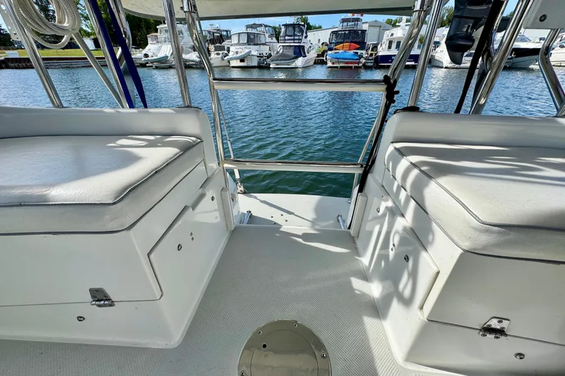 Ostrich Yacht Photos Pics 2004 Catalina 42 MkII yacht cockpit with marina view and cushioned seating.