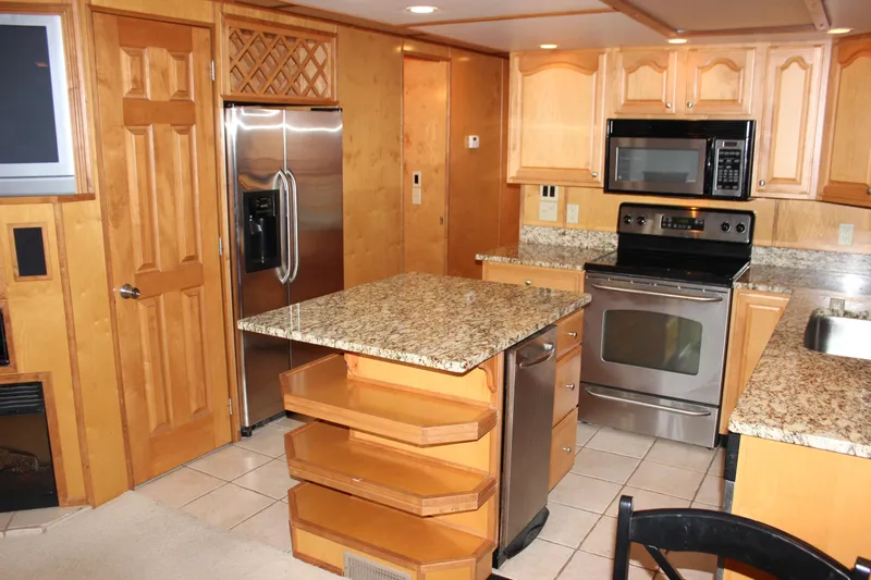  Yacht Photos Pics Luxurious 2007 Legacy Yachts Majestic kitchen with granite countertops and stainless steel appliances.