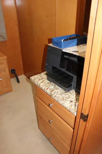  Yacht Photos Pics 2007 Legacy Yachts Majestic interior with granite countertop and wooden cabinetry.