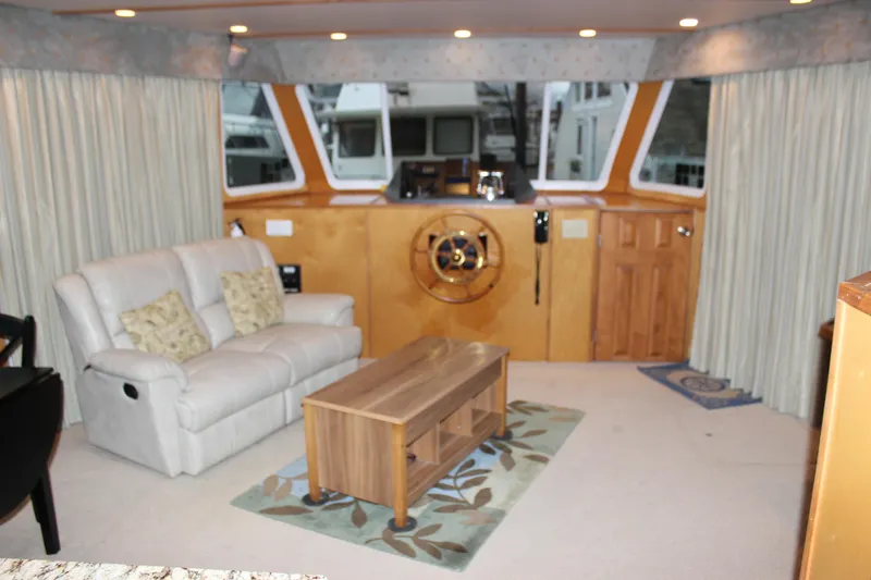 Yacht Photos Pics Luxurious 2007 Legacy Yachts Majestic interior with plush seating and elegant helm.