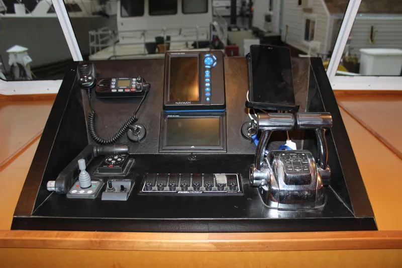  Yacht Photos Pics Control panel of 2007 Legacy Yachts Majestic with navigation and communication equipment.