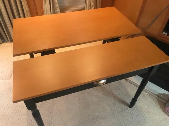  Yacht Photos Pics Wooden table with two sections, located inside a 2007 Legacy Yachts Majestic.