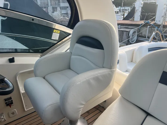 Desert Dream Yacht Photos Pics Luxurious seating on a 2007 Sea Ray 40 Sundancer yacht, featuring plush white upholstery.