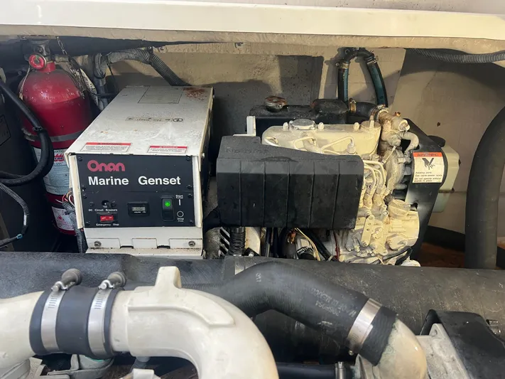 Desert Dream Yacht Photos Pics Engine compartment of a 2007 Sea Ray 40 Sundancer with Onan Marine Genset.