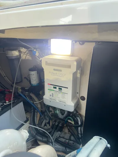 Desert Dream Yacht Photos Pics Engine room of 2007 Sea Ray 40 Sundancer with ProNautic 12-50P charger and wiring.