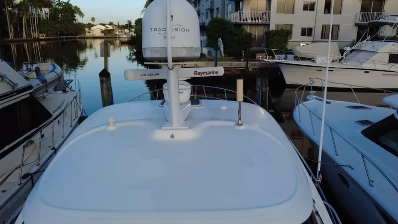 Desert Dream Yacht Photos Pics 2007 Sea Ray 40 Sundancer docked, featuring radar and navigation equipment.