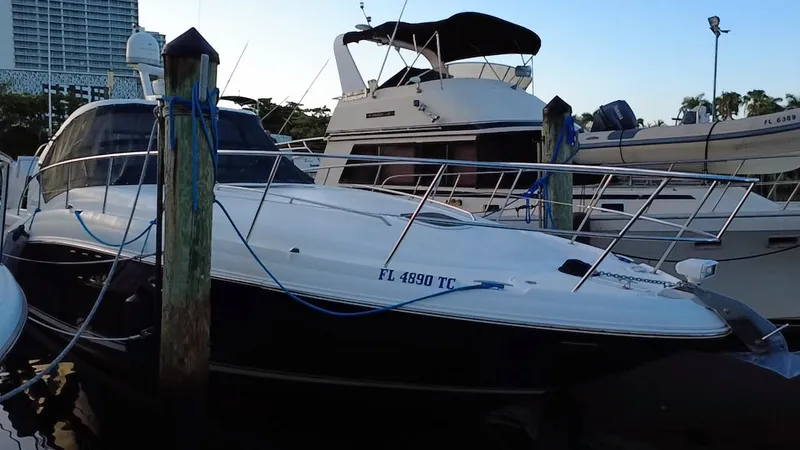 Desert Dream Yacht Photos Pics 2007 Sea Ray 40 Sundancer yacht docked at marina, side view.