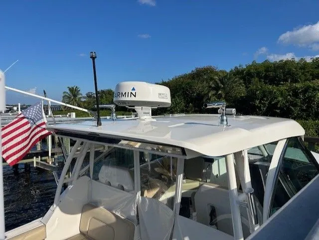  Yacht Photos Pics 2017 Pursuit DC 325 Dual Console boat with Garmin radar and American flag.