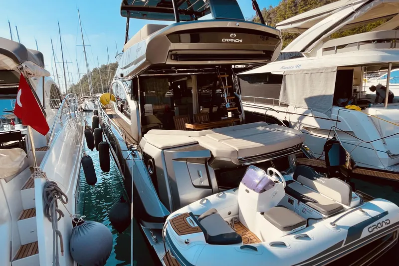  Yacht Photos Pics Luxury Cranchi E 52F Evoluzione yacht docked in marina, 2020 model.