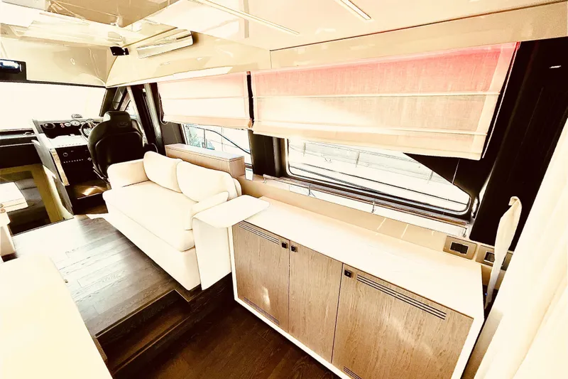  Yacht Photos Pics Interior of 2020 Cranchi E 52F Evoluzione yacht with modern seating and helm station.