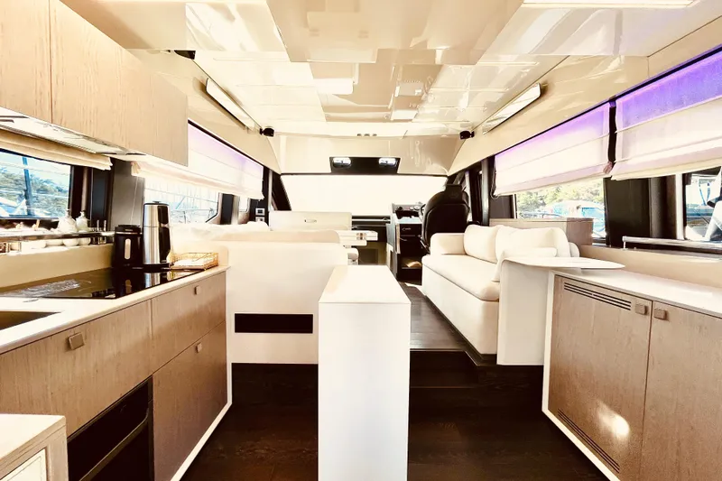  Yacht Photos Pics Luxurious interior of 2020 Cranchi E 52F Evoluzione yacht with modern furnishings.