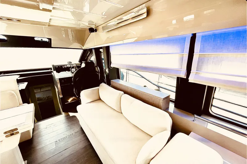  Yacht Photos Pics Luxurious interior of 2020 Cranchi E 52F Evoluzione yacht with modern furnishings.