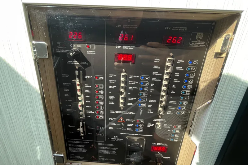  Yacht Photos Pics Control panel of a 2020 Cranchi E 52F Evoluzione yacht, displaying various electrical settings.