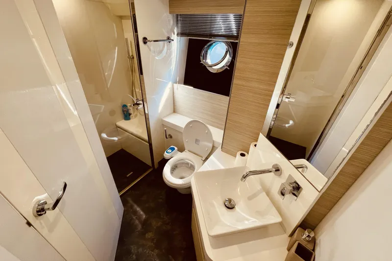  Yacht Photos Pics Luxurious bathroom in 2020 Cranchi E 52F Evoluzione yacht with modern fixtures.