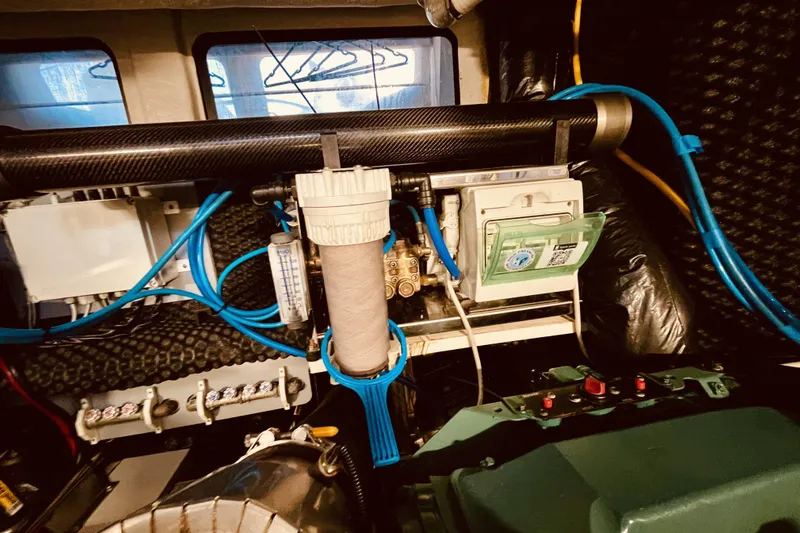  Yacht Photos Pics Engine room of 2020 Cranchi E 52F Evoluzione yacht with visible machinery and wiring.