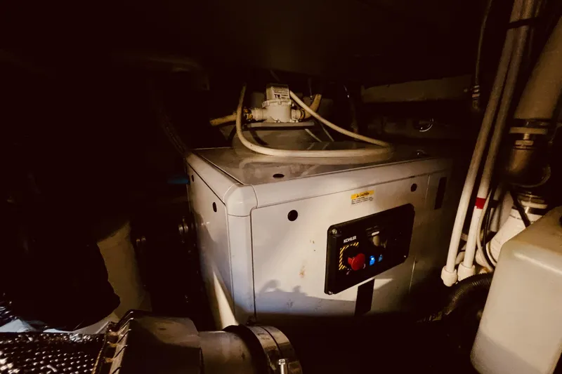  Yacht Photos Pics Engine room of 2020 Cranchi E 52F Evoluzione yacht with visible machinery and wiring.