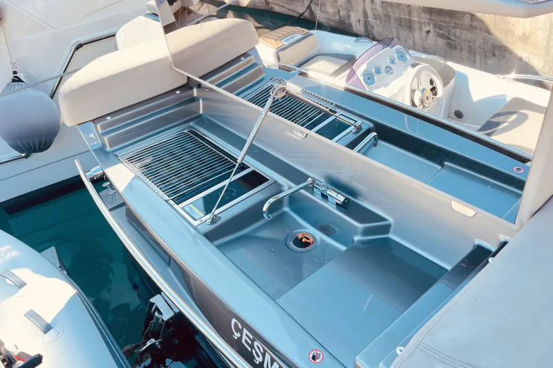  Yacht Photos Pics 2020 Cranchi E 52F Evoluzione yacht with sleek deck and modern controls.