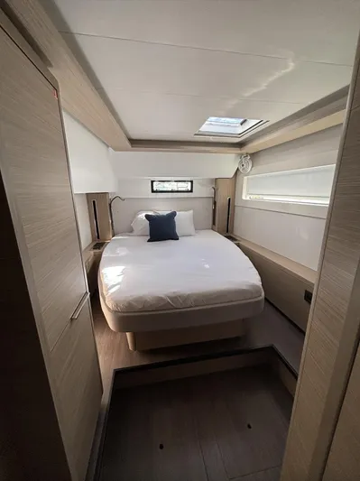  Yacht Photos Pics Luxurious cabin interior of 2025 Lagoon 46 yacht with modern design.