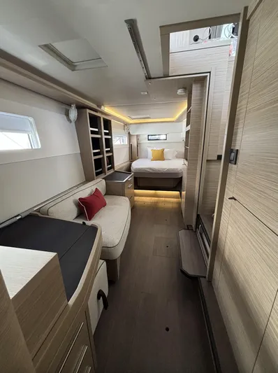  Yacht Photos Pics Luxurious interior of 2025 Lagoon 46 yacht with modern furnishings and ambient lighting.