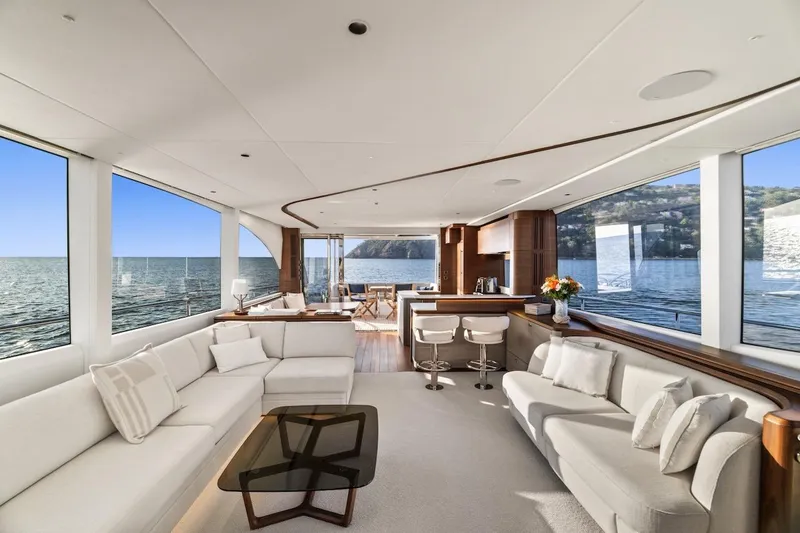  Yacht Photos Pics Luxurious interior of 2025 Princess Y72 yacht with panoramic ocean views and elegant furnishings.