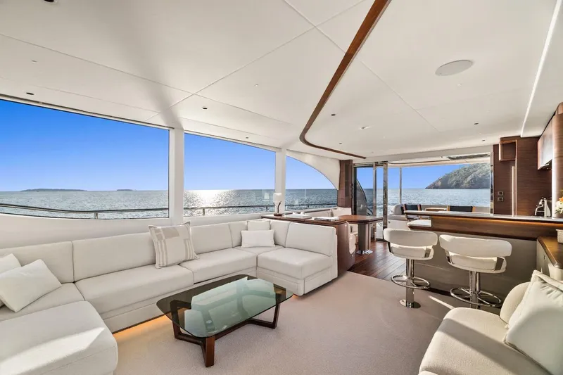  Yacht Photos Pics Luxurious 2025 Princess Y72 yacht interior with elegant seating, ocean view, and modern design.