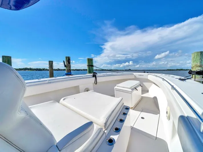  Yacht Photos Pics SeaHunter 45 boat interior, 2015 model, with white seating and ocean view.