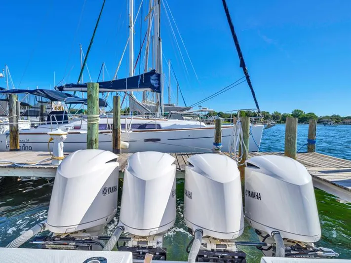  Yacht Photos Pics 2015 SeaHunter 45 with Yamaha outboard engines docked at a marina.