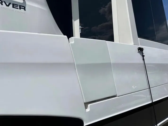  Yacht Photos Pics 2000 Carver 506 Motor Yacht, sleek white exterior detail.