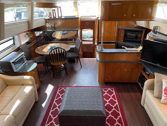  Yacht Photos Pics Interior of 2000 Carver 506 Motor Yacht with elegant wood finishes and modern amenities.